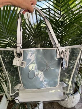 Rare Coach lmt edition XL clear beach resort tote, seahorse charm & wristlet NWT